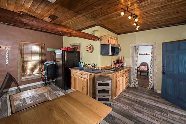 The dining area and kitchen.