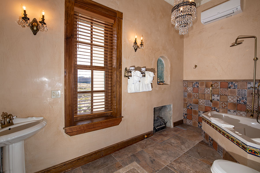 Wide view of bathroom.